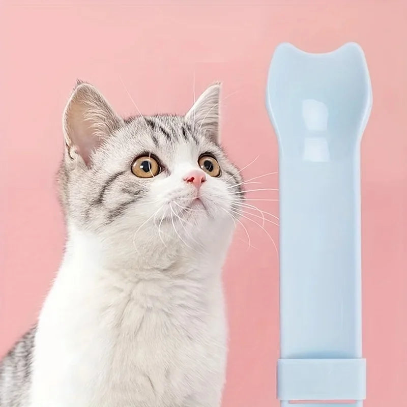 Light blue cat lick treat spoon with capped end