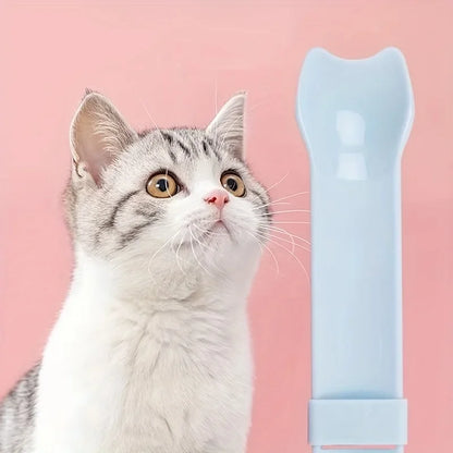 Light blue cat lick treat spoon with capped end