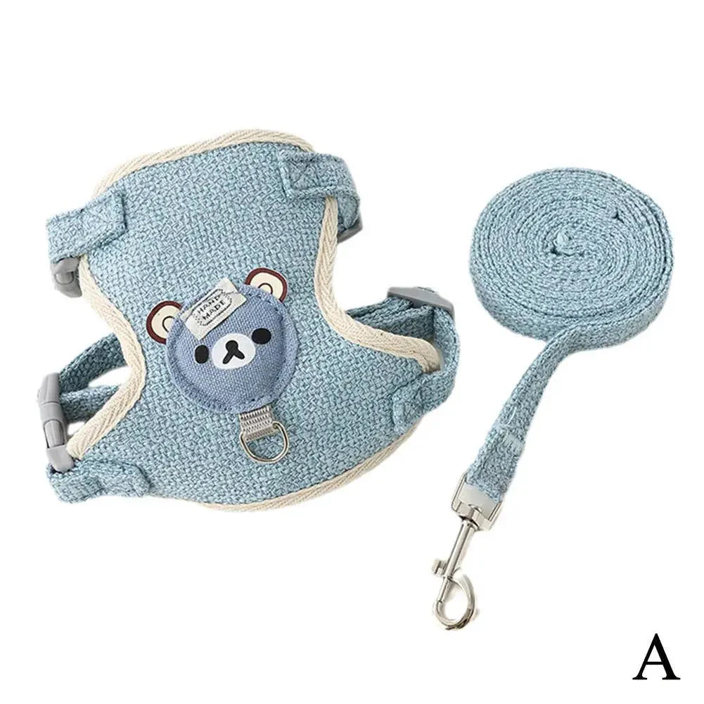 Light blue pet harness vest with bear patch and adjustable leash, coiled rope