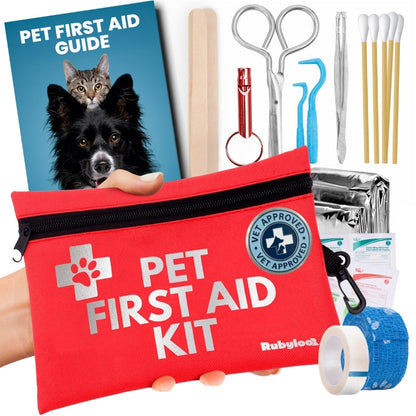 Red pet first aid kit bag with black zipper, paw logo, shown with supplies