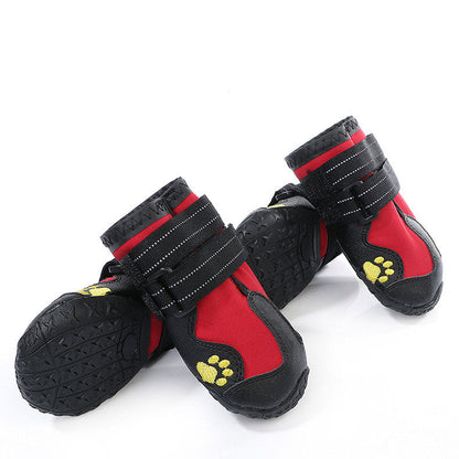 Red and black waterproof dog boots with paw-print logos and hook-and-loop straps