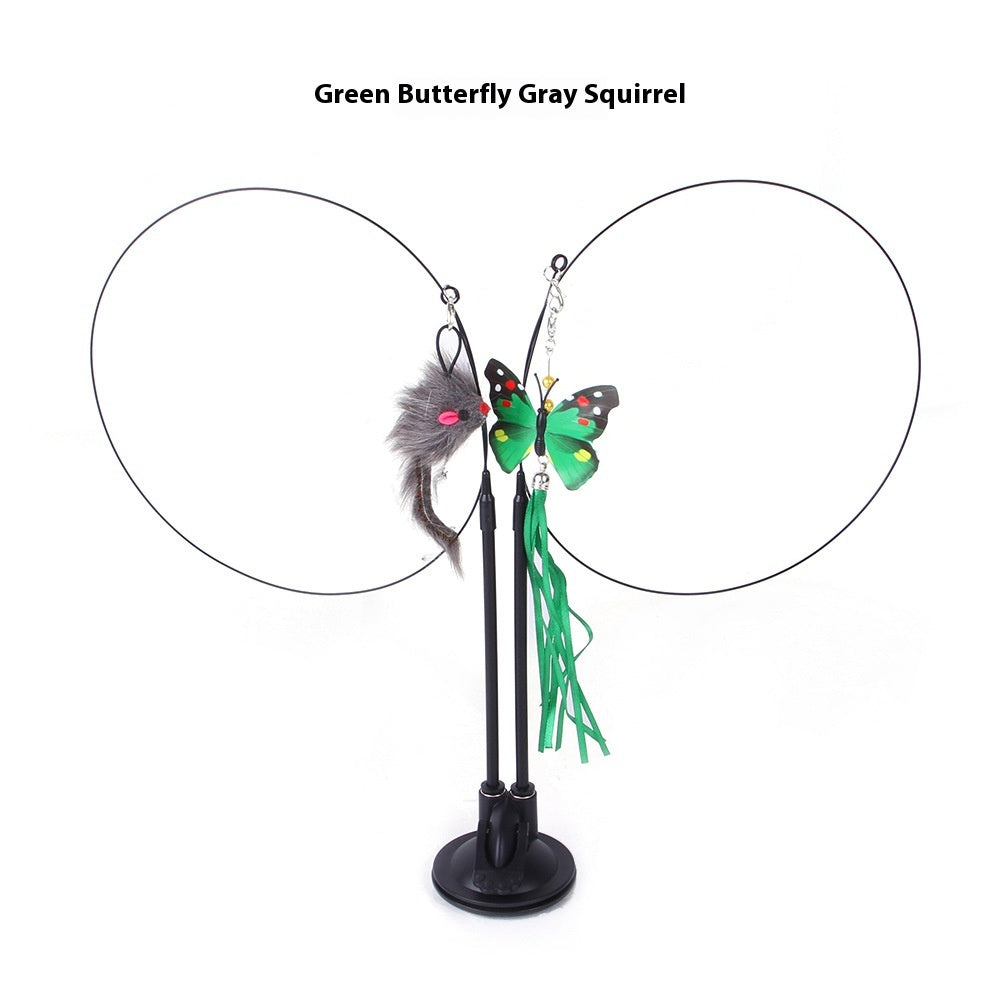 Cat teaser toy with green butterfly plush, gray squirrel tail, and dangling feather