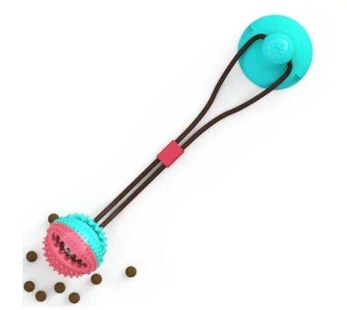 Interactive dog chew toy with suction cup base and treat-dispensing design for mental stimulation