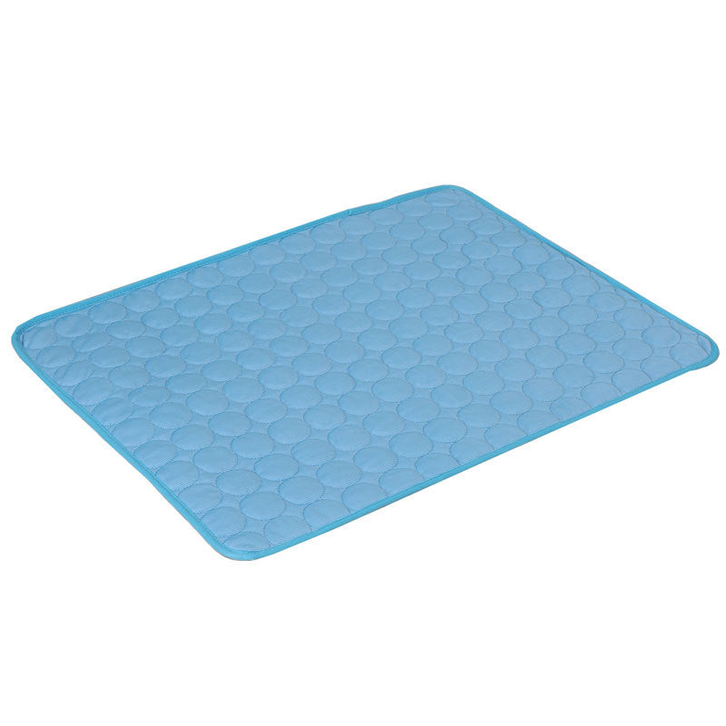 Blue cooling pet mat with textured honeycomb surface and rounded corners
