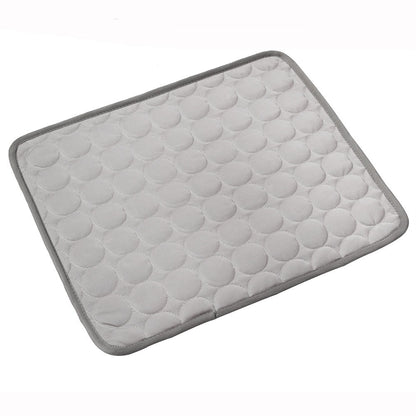 Gray cooling pet mat with textured honeycomb surface and light gray stitched edges
