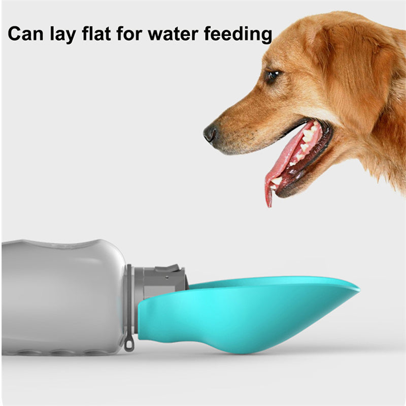 Portable dog water bottle with turquoise trough that flips out; can lay flat for feeding