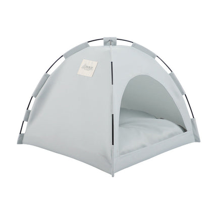 Light gray pet tent bed with arched frame and white padded interior