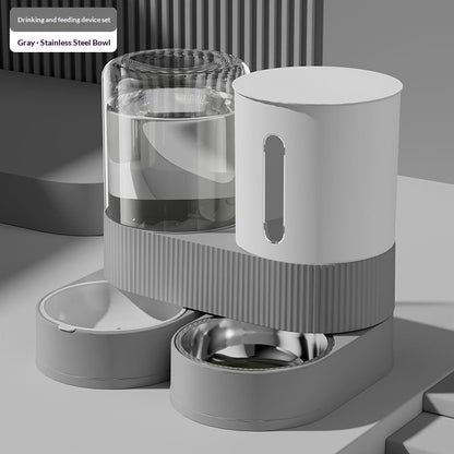 Automatic pet water and food dispenser with stainless steel bowl, gray base and white bin
