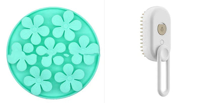 Cat steam brush set, teal round massage pad and white handheld oval brush