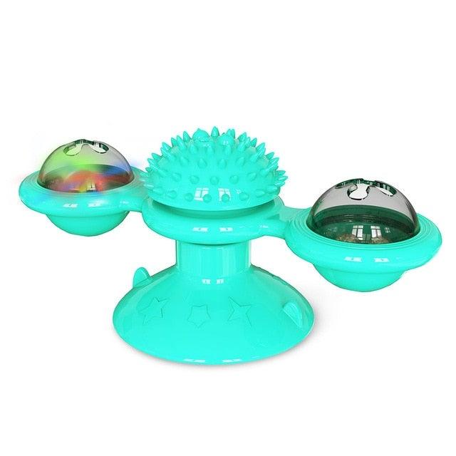 Cat windmill toy in turquoise with spiky massage top and two rotating domed cups
