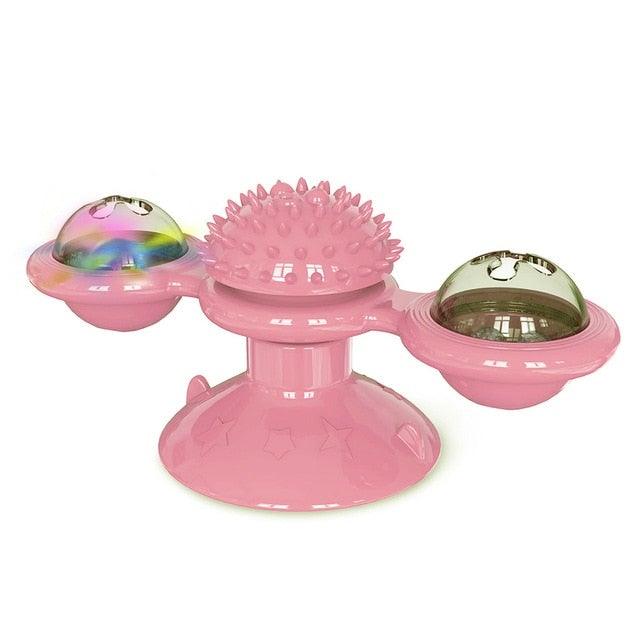 Cat windmill toy in pink with spiky massage top and two rotating domed side cups