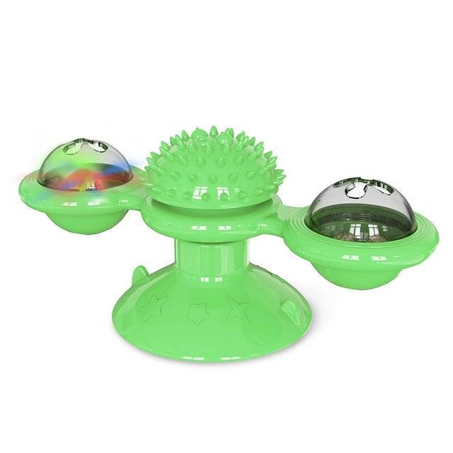 Cat windmill toy in bright green with spiky massage top and two rotating domed cups