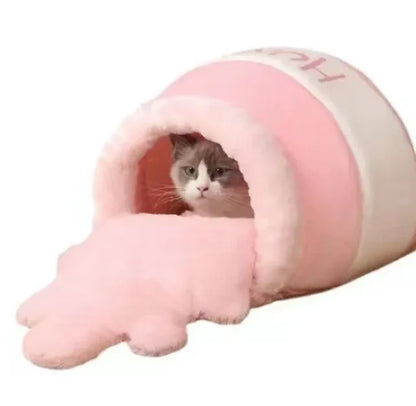 Pink plush cat tunnel bed with cozy interior, perfect for feline comfort and play