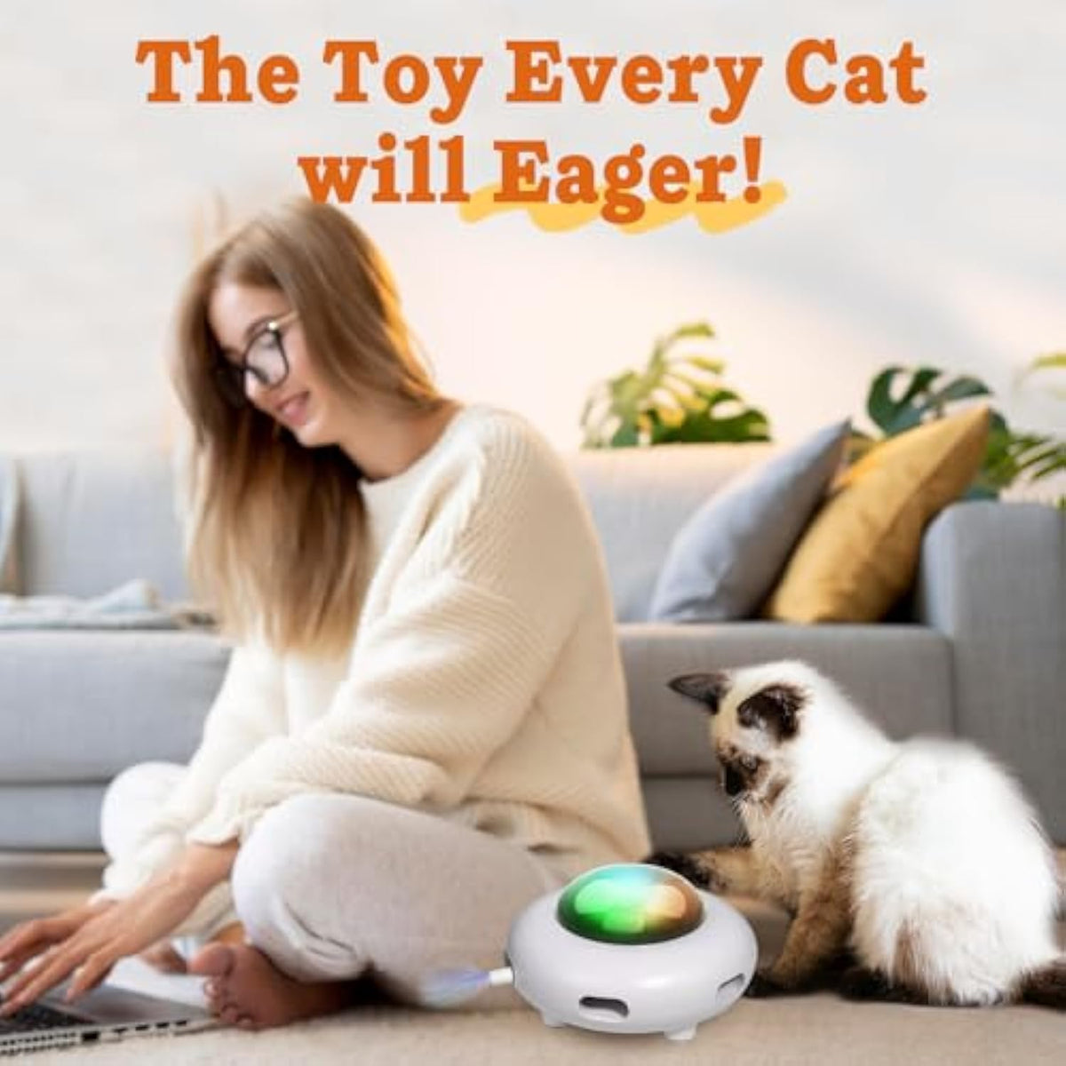 White automatic LED UFO cat toy with glowing dome, shown with cat nearby