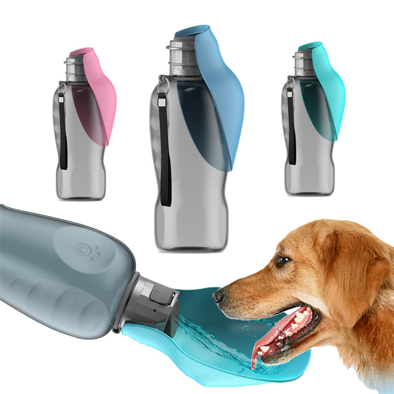 Portable dog water bottle with turquoise flip drinking bowl and silver body; dog drinking