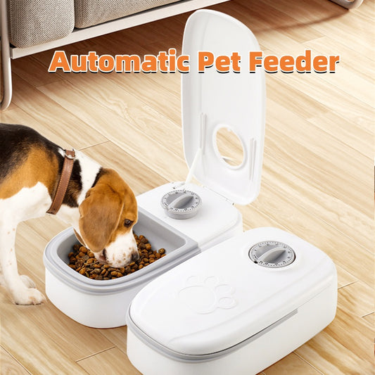 Pet feeder with open lid, white double bowls, and two dial controls for pet meals