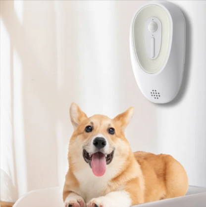 Wall-mounted odor eliminator device, white oval with indicator button and lower vent