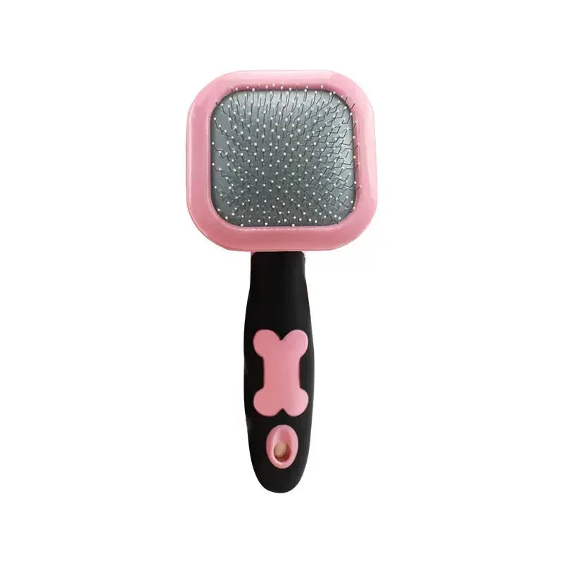 Pet shedding brush with rounded pink pad, gray pins, black handle with bone icon
