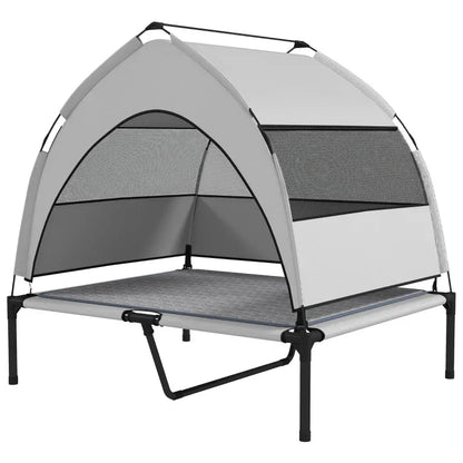 Light gray elevated dog bed with removable canopy, dark mesh windows, and padded mat