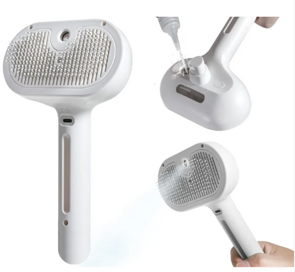 White pet hair spray brush with gray bristle pad and back sprayer nozzle