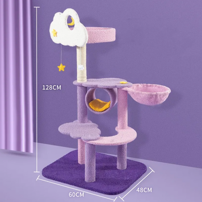 Cat climbing tower with purple base, lavender platforms, white cloud top, and hanging moon charms