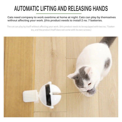 Automatic cat toy attached to edge with gray plush ball on a cord