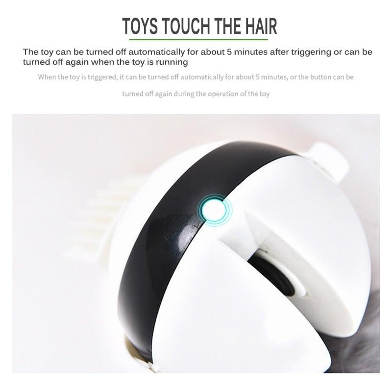 Automatic cat teaser device with black-and-white body and blue status light