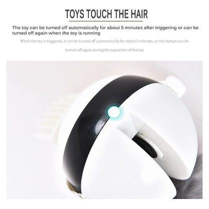 Automatic cat teaser device with black-and-white body and blue status light