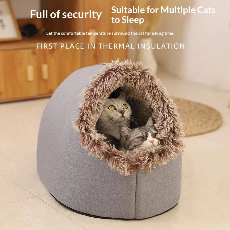Two cats resting inside a gray Pet Zen enclosed winter cat bed with a fluffy faux fur lining.
