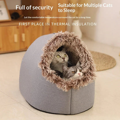 Two cats resting inside a gray Pet Zen enclosed winter cat bed with a fluffy faux fur lining.