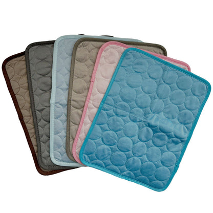 Set of cooling pet mats in blue, gray, beige, and brown with honeycomb texture