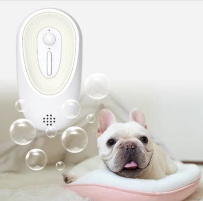 Wall-mounted odor eliminator device, white oval with central button and vent