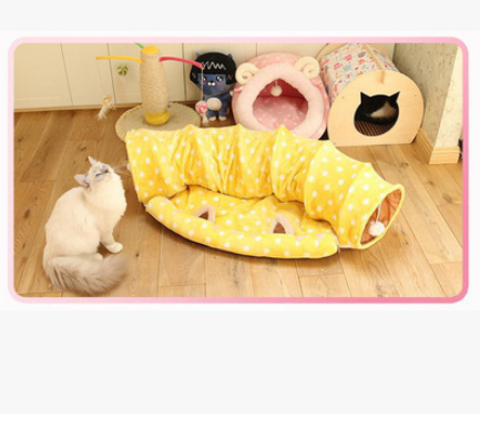 Yellow polka-dot cat tunnel bed with long padded tunnel and circular entry opening