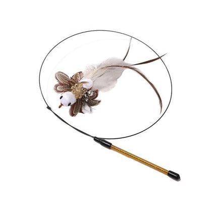 Cat teaser wand with brown plush feather bird toy and white pom pom on string