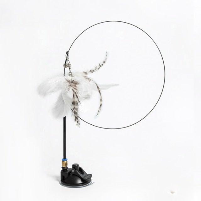 Cat teaser wand base with white plush feather bird toy and circular play loop