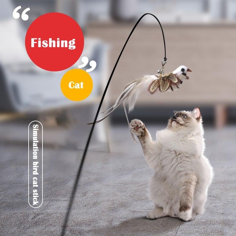 Cat teaser wand with feather toy and small bell, dangling from a thin string.
