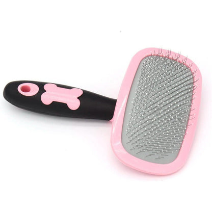 Pink slicker pet grooming brush with oval metal-pin pad and light pink base
