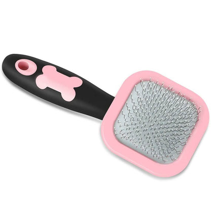 Pink slicker pet grooming brush with rubber grip handle and metal pin bristle pad