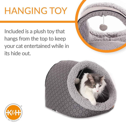Jeffers heated cat bed with a grey pattern and a plush hanging toy for cats.