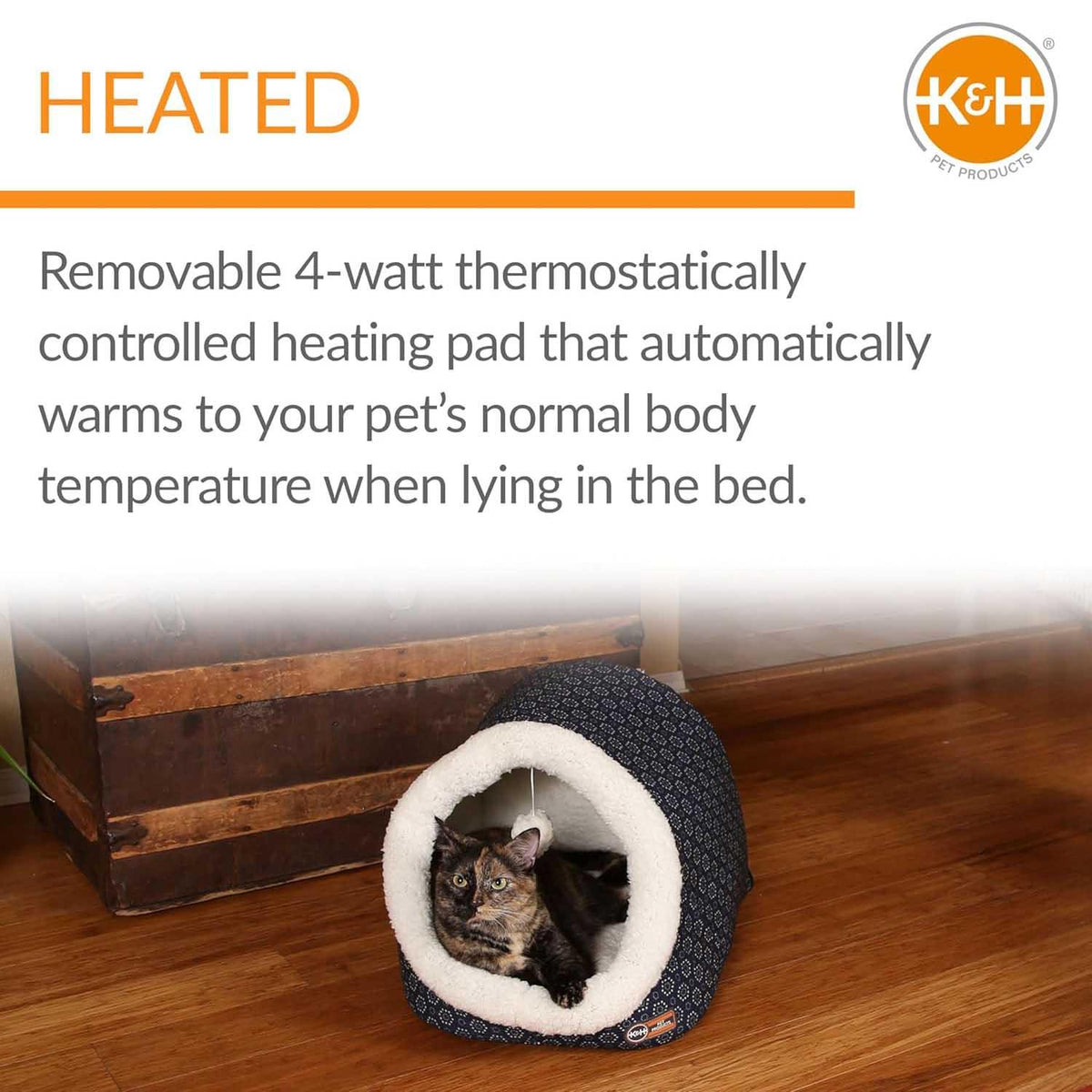 Jeffers Thermo-Pet Cave heated cat bed with a tortoiseshell cat resting inside.