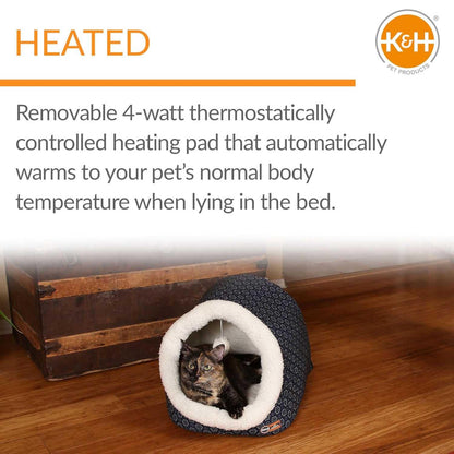 Jeffers Thermo-Pet Cave heated cat bed with a tortoiseshell cat resting inside.