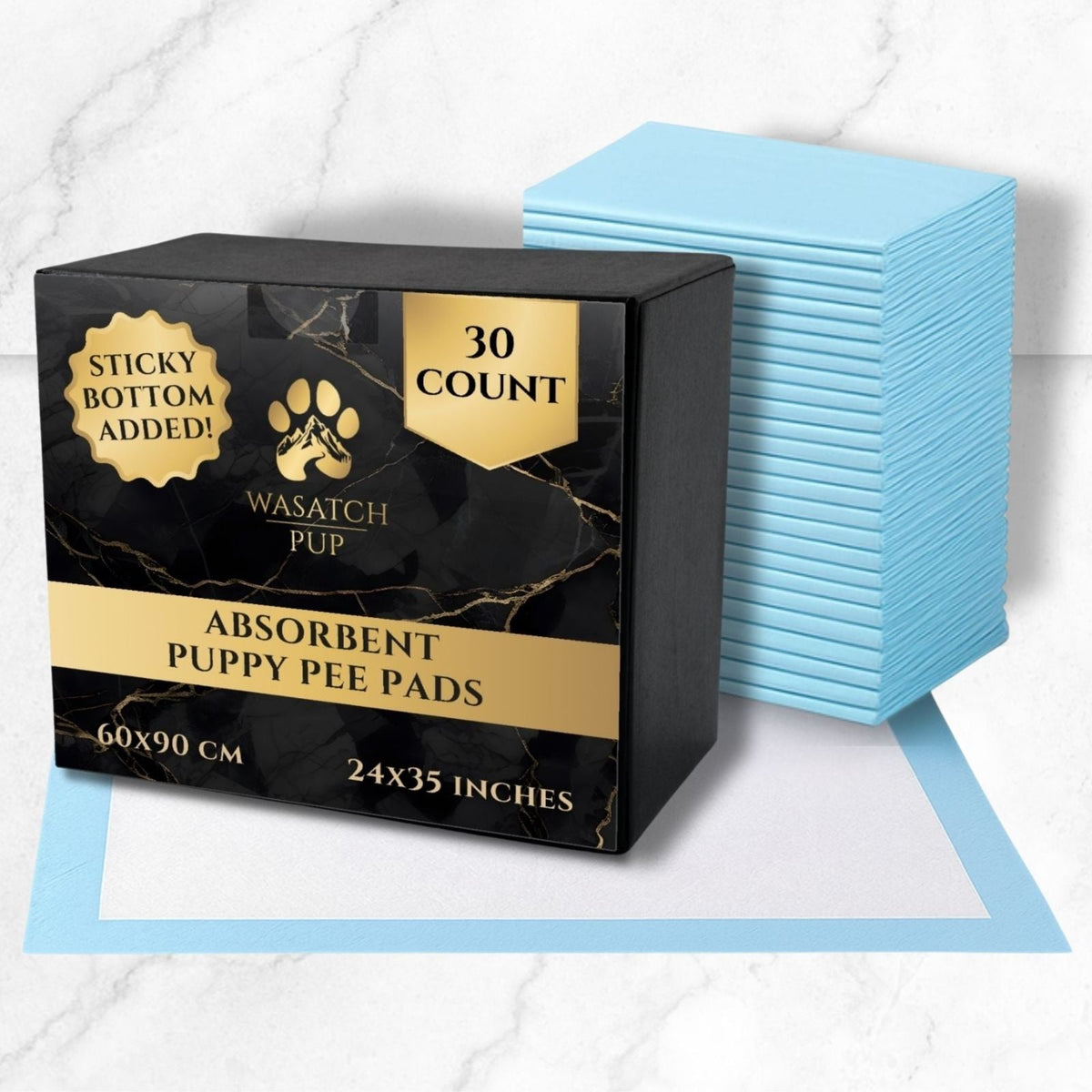 Boxed absorbent puppy pee pads with stacked light blue absorbent pads