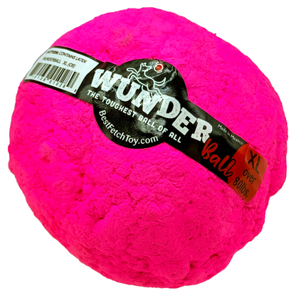 Pink textured fetch toy ball with printed black label band and barcode sticker