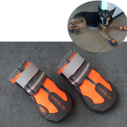 Orange and black dog waterproof booties with gray hook-and-loop straps