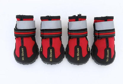 Waterproof dog boots, red and black with white cuffs and double strap bands