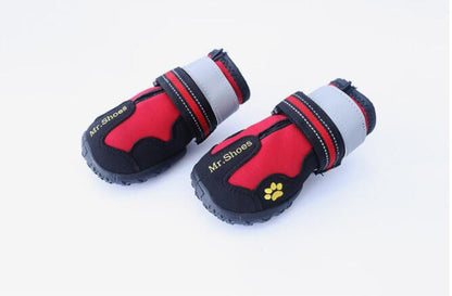 Waterproof dog shoes, red interior with black sides, white cuffs, red paw patch