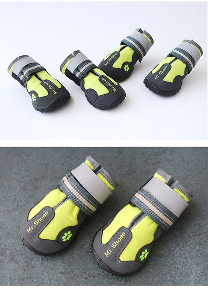 Waterproof dog boots, lime green with black soles, white cuff accents, strap