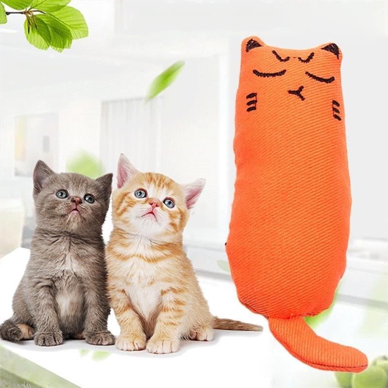Orange plush catnip toy cat with closed-eye face and curled tail.